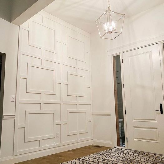 Custom millwork entranceway by Metrie.